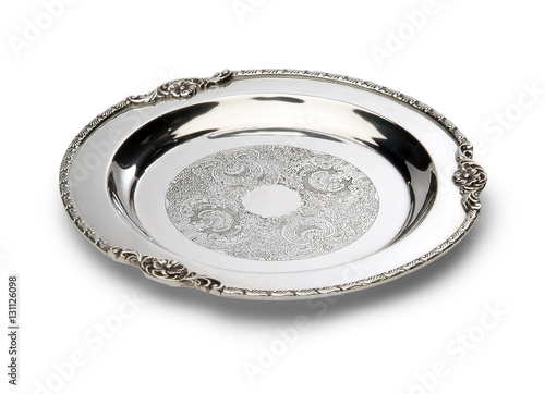 Chiseled round tray of silver plate