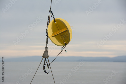 Gold radar reflector on sailboat