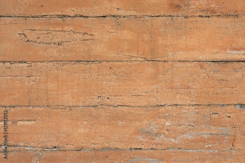 Old cracked wooden wall painted brown