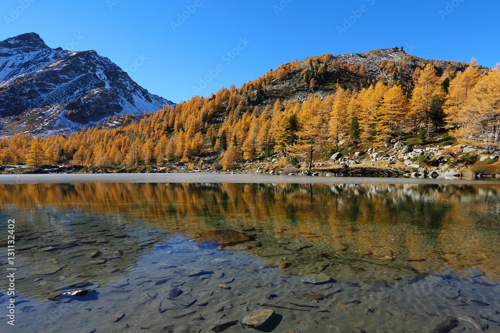 Fototapeta premium Arpy lake reflection with autumn trees