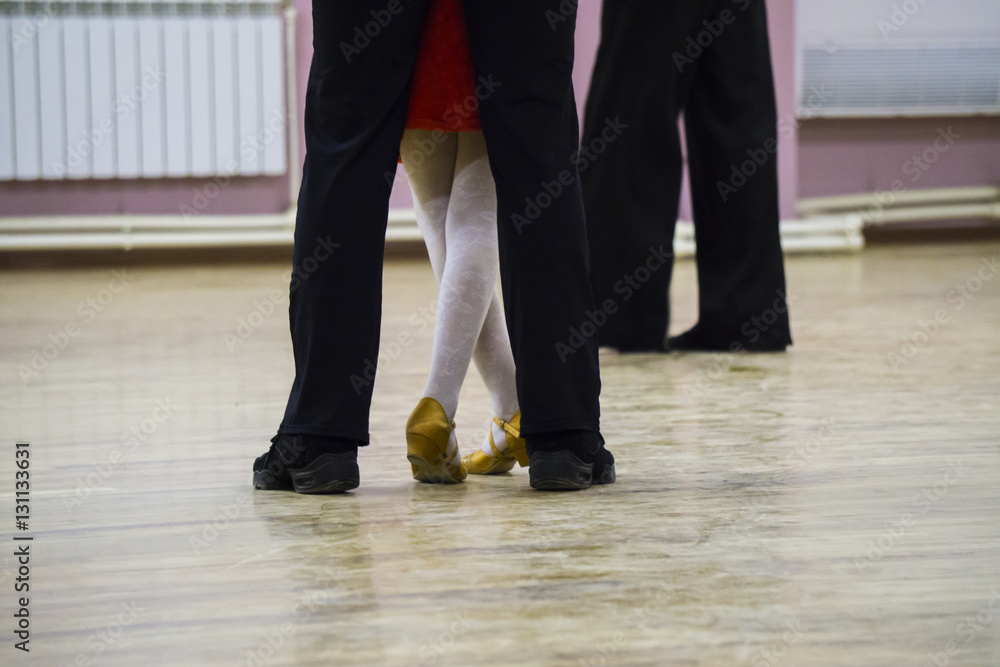 Fototapeta premium Feet ballroom dancers on the dance floor