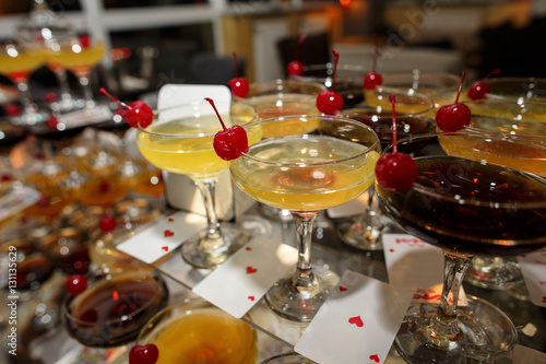 Alcoholic drinks, bartender made colorful cocktails for alcohol party
