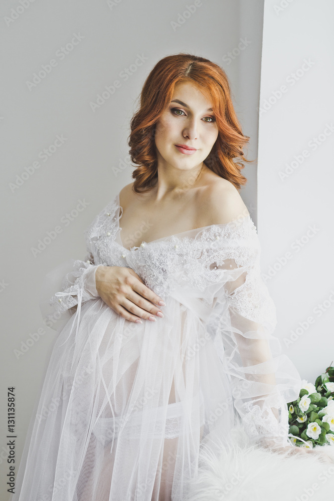 Gentle pregnancy in white robes 6855.
