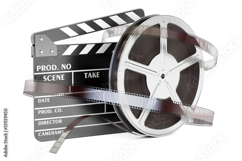 Cinema and cinematography concept. Clapperboard with film reels,