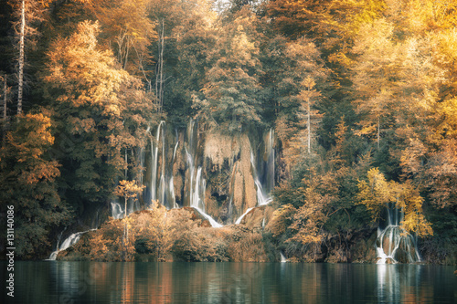 Fototapeta Naklejka Na Ścianę i Meble -  Beautiful autumn forest waterfall