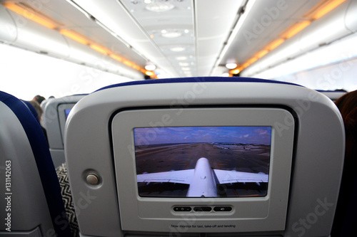 Interior of commercial aircraft- close-up of LCD rear seat showing live images from outside the plane