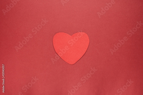 red heart on paper background