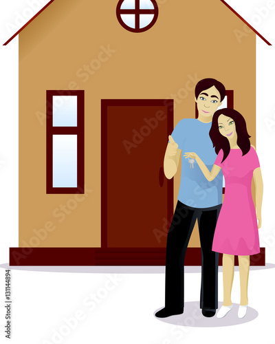 Happy couple with house keys