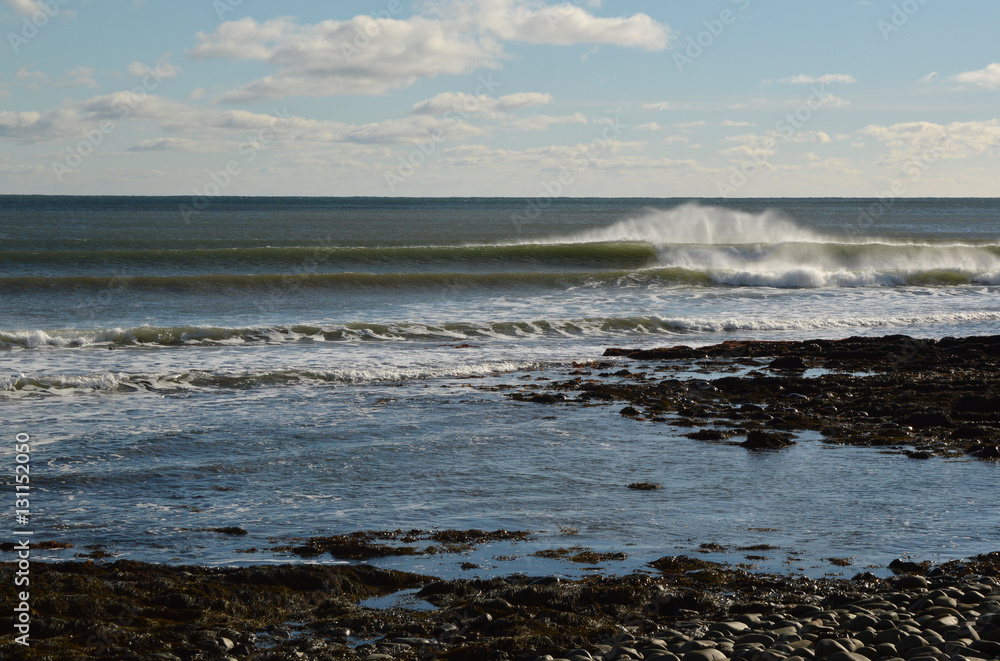well lit right breaking wave lining up perfectly at reef break o