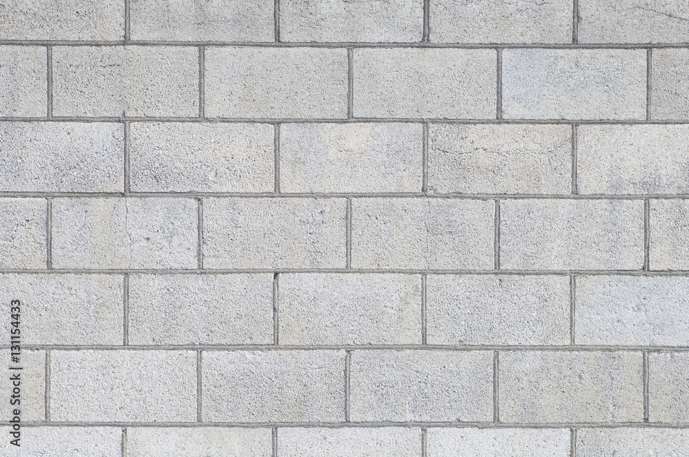 Fototapeta premium Concrete block wall seamless background and texture..