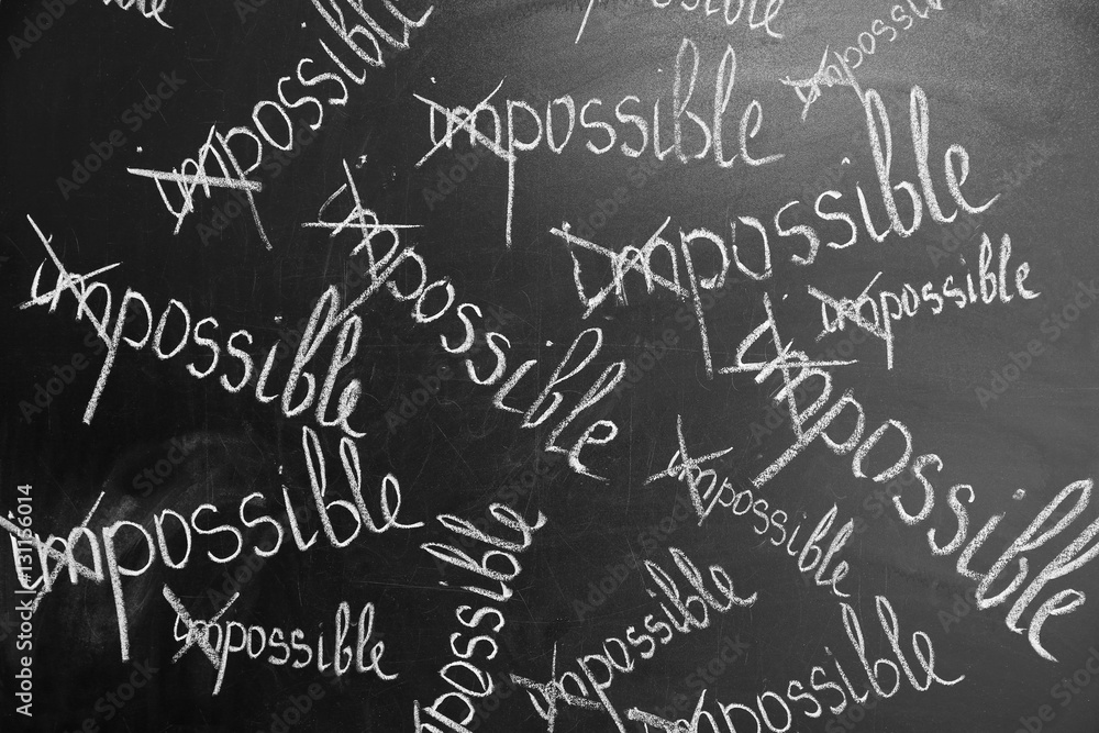 Transformed IMPOSSIBLE words on chalkboard Transformed IMPOSSIBLE words on chalkboard