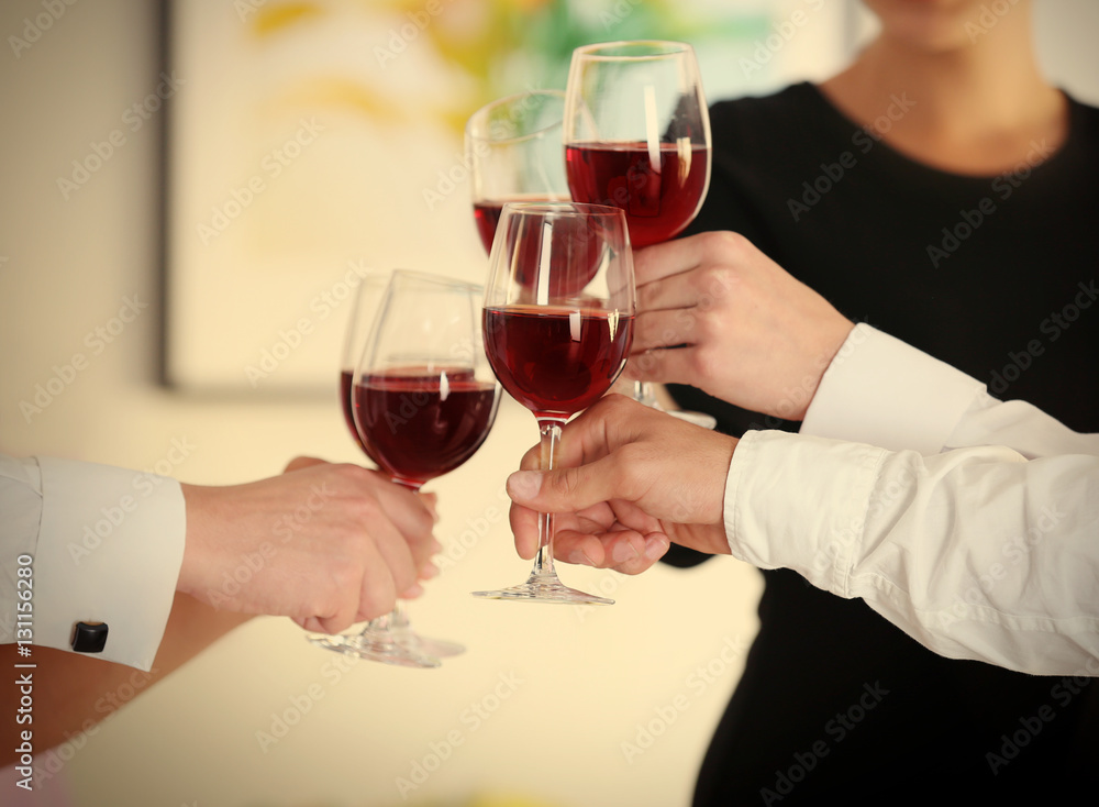 People clinking glasses at party, close up view People clinking glasses at party, close up view
