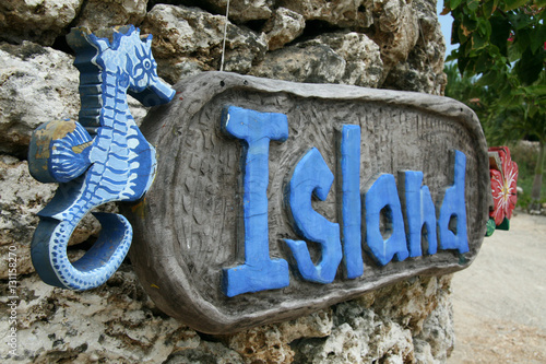 Tropical Island Sign - Taketomi Island , Okinawa, Japan photo