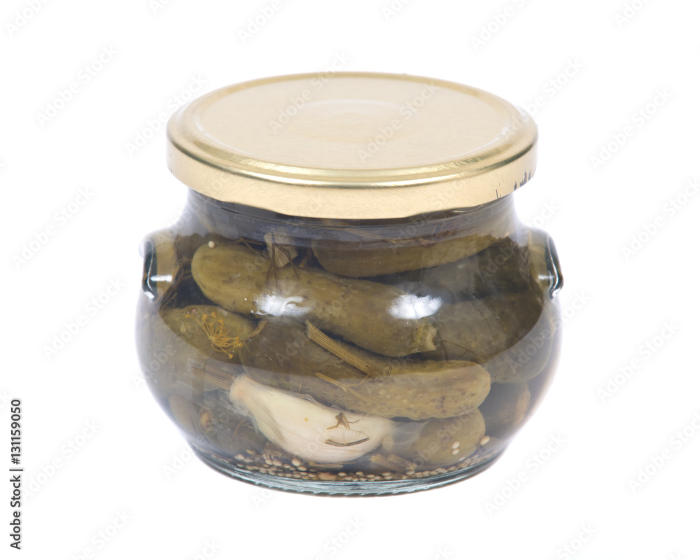 Natural organic dill cucumbers in jar isolated on white background Natural organic dill cucumbers in jar isolated on white background