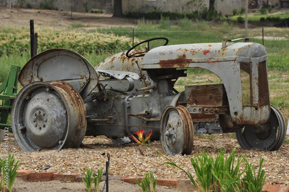 Old tractor on a farm in Kalbaskraal, Western Cape, South Africa Old tractor on a farm in Kalbaskraal, Western Cape, South Africa