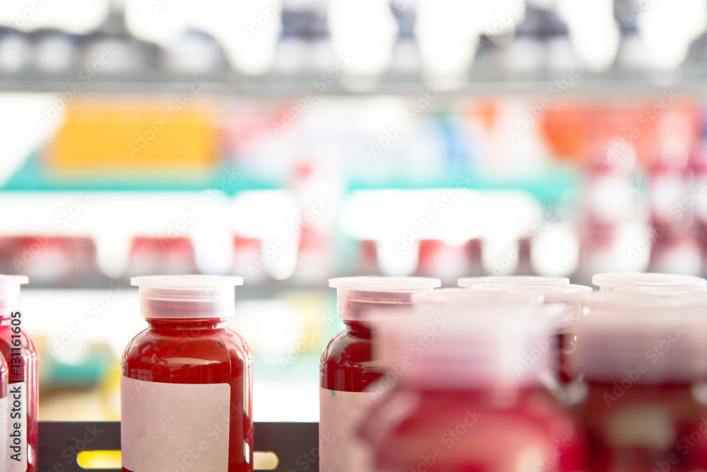 sample color bottle on the shelves in the lab testing room sample color bottle on the shelves in the lab testing room