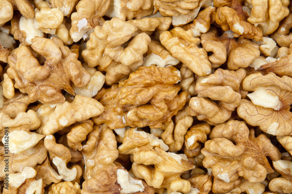 Closeup of shelled walnuts pile walnut background Closeup of shelled walnuts pile walnut background