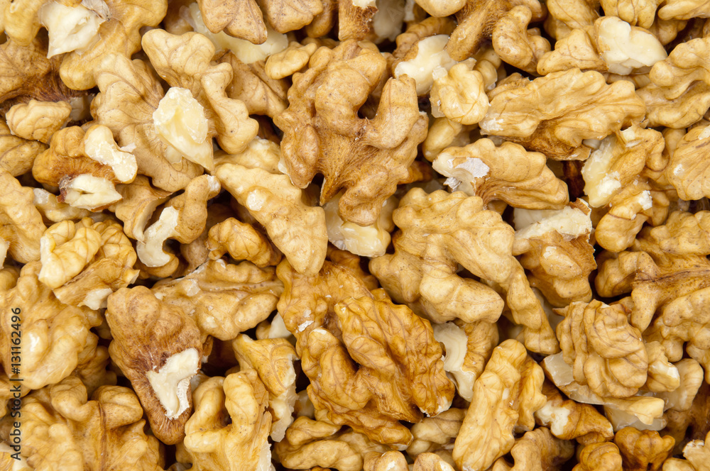 Closeup of shelled walnuts pile walnut background Closeup of shelled walnuts pile walnut background