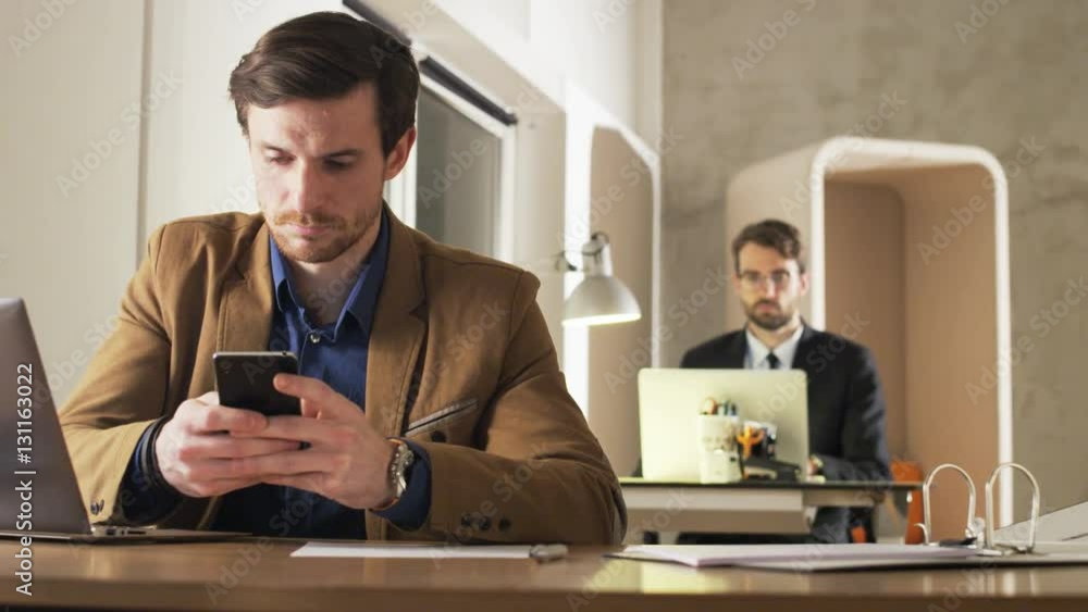 Young Businessman Busy With His Phone Young Businessman Busy With His Phone