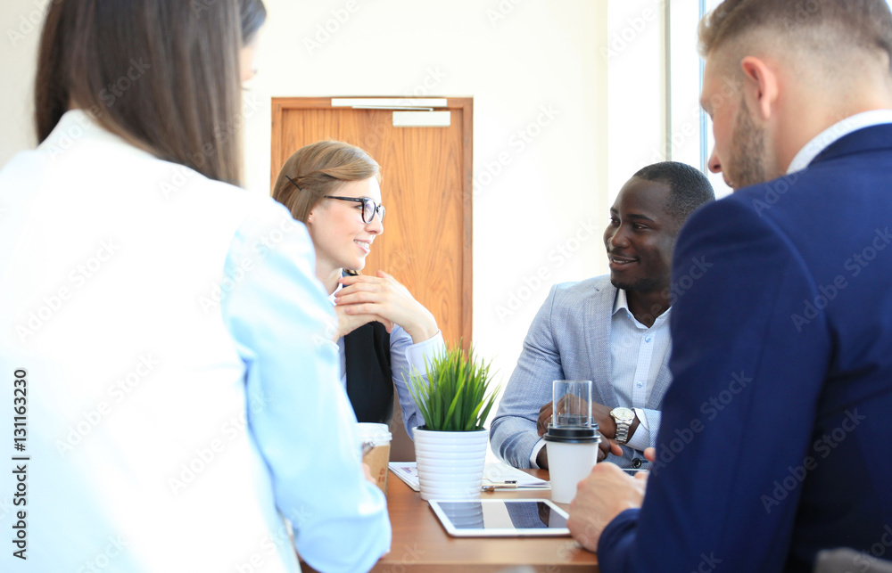 Portrait of smart business partners planning work at meeting Portrait of smart business partners planning work at meeting