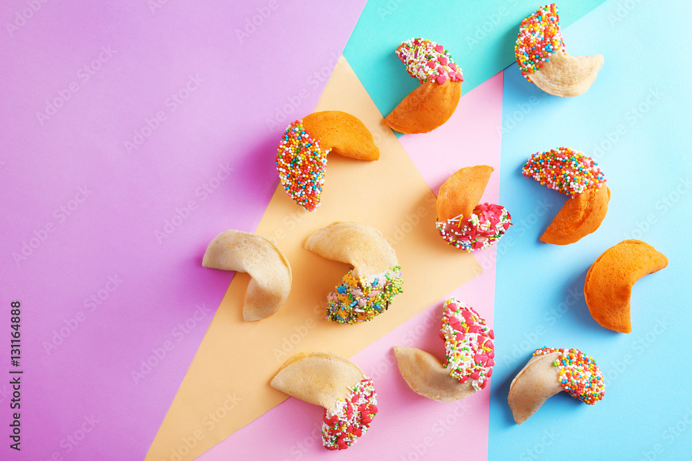 Fortune cookies on color background 스톡 사진 | Adobe Stock