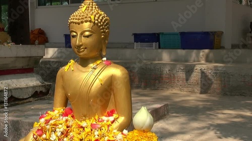 Loi Katong is Thailand's celebration of water. In this clip water is poured over the shoulder of a Buddha figure as a traditional and respectful gift of water to Buddha.