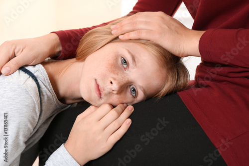 Woman becalming little sad ...