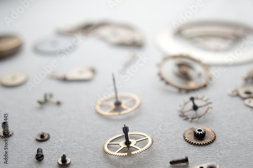 Detail of watch machinery on the table.