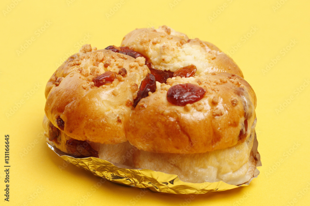 Bakery Raisin bread on yellow background Bakery Raisin bread on yellow background
