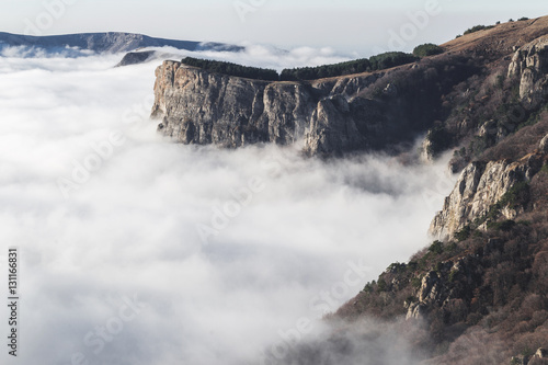 Rocks covered by low clouds, top of Demerdji in Crimea