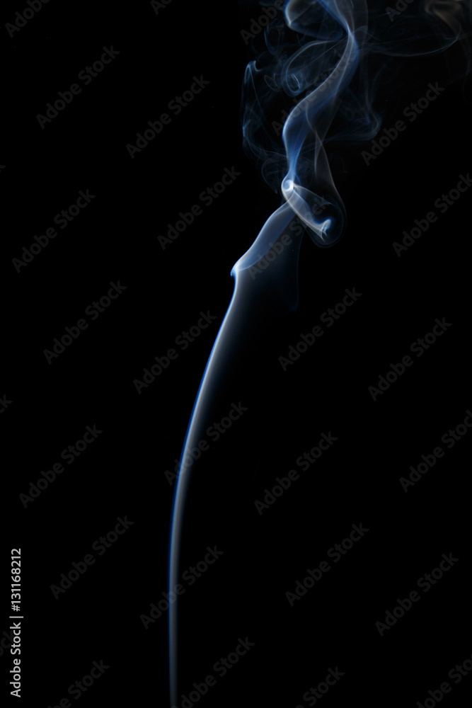 Abstract art. Color white blue smoke from the aromatic sticks on a black background. Background for Halloween. Texture fog. Design element. The concept of aromatherapy. Abstract art. Color white blue smoke from the aromatic sticks on a black background. Background for Halloween. Texture fog. Design element. The concept of aromatherapy.