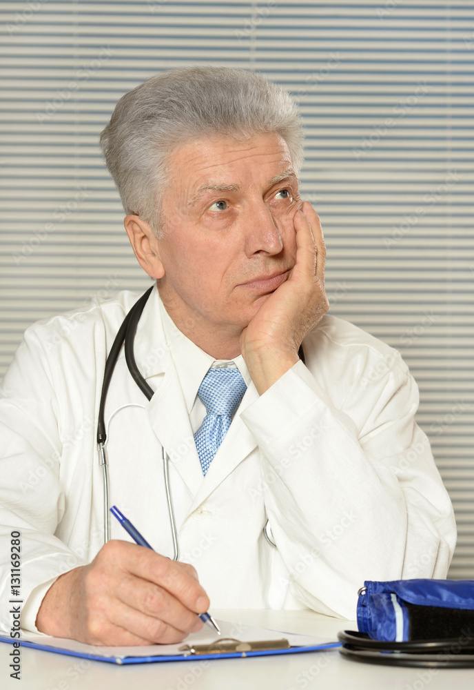 mature male doctor mature male doctor