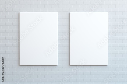 `Two white posters hanging on the wall, mock up