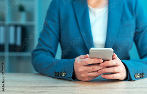 Businesswoman using smartphone