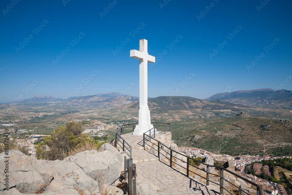 landmark of walkway towards great crucifix in Santa Catalina or St Catherine mountain, public monument and lookout balcony over Jaen city, Andalusia, Spain Europe
