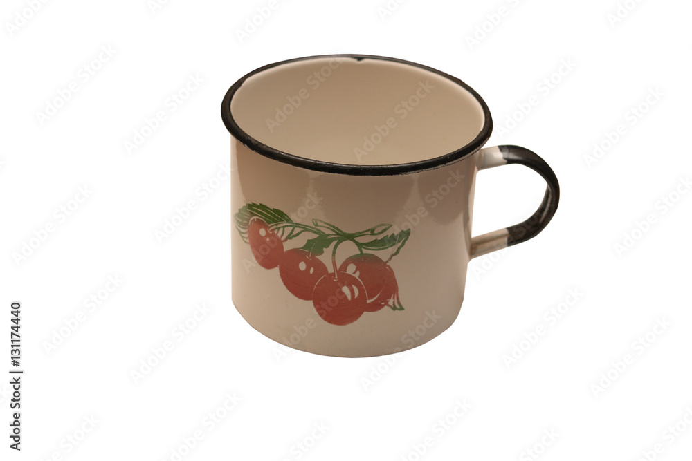 Old enamel mug on a white background. Old enamel mug on a white background.