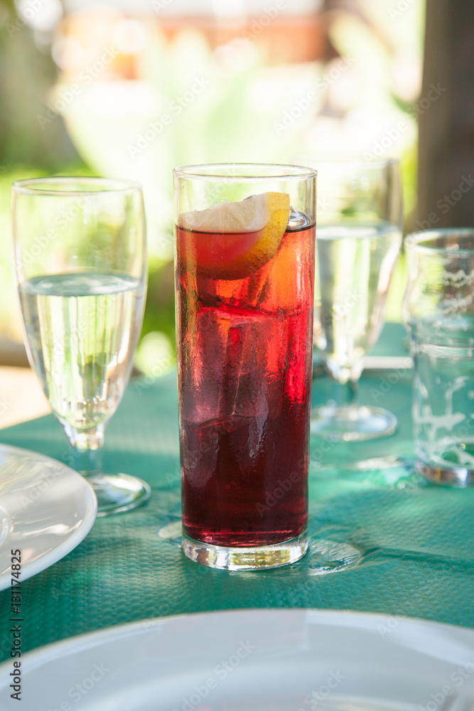 wine with soda tall glass on green tablecloth wine with soda tall glass on green tablecloth