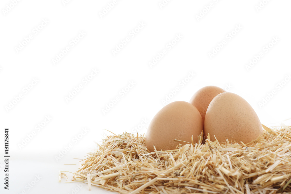 Brown eggs in a farm straw Brown eggs in a farm straw