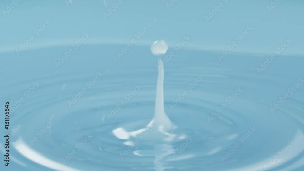 slow motion drop of blue color water shot in 180fps, prores footage slow motion drop of blue color water shot in 180fps, prores footage