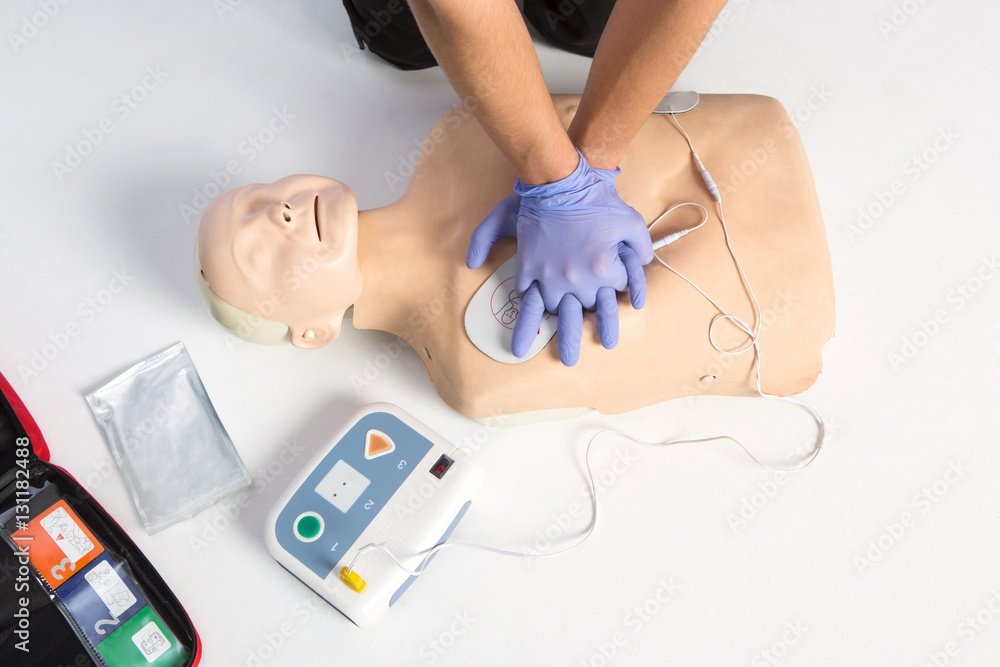 Paramedic demonstrate Cardiopulmonary resuscitation (CPR) on dumm