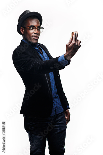 The black man with happy expression with phone