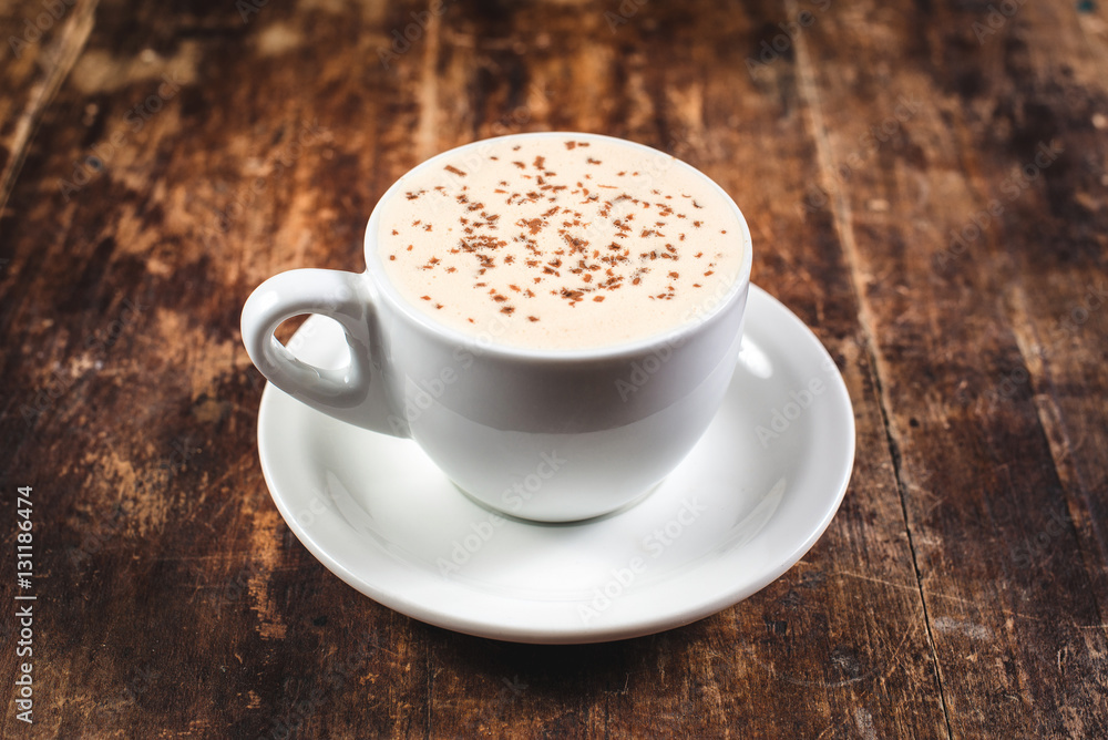 Cup of coffee with ice cream and chocolate on wooden background Cup of coffee with ice cream and chocolate on wooden background