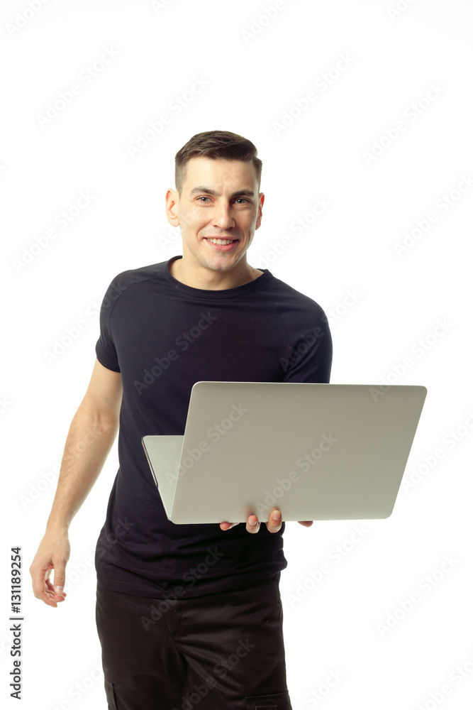 Portrait of smiling young man with laptop isolated Portrait of smiling young man with laptop isolated