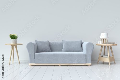 The interior has a gray sofa and lamp on empty white wall background,3D rendering