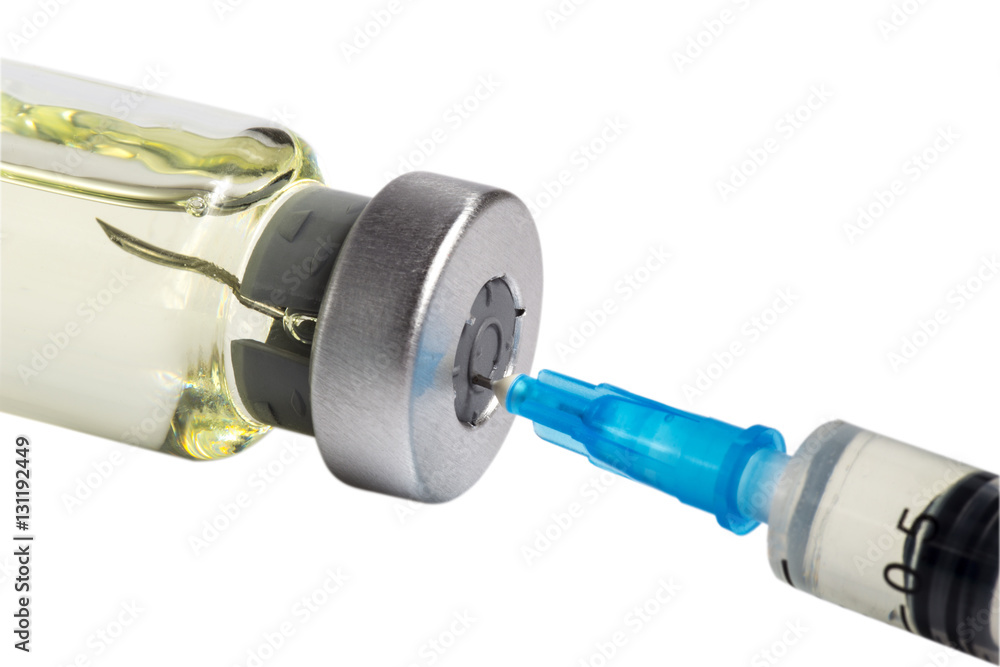 Medicine bottle with yellow drug lying. Needle of medical syringe inside the cap of the ampule. Isolated on white background. Macro image.
Medicine bottle with yellow drug lying. Needle of medical syringe inside the cap of the ampule. Isolated on white background. Macro image.