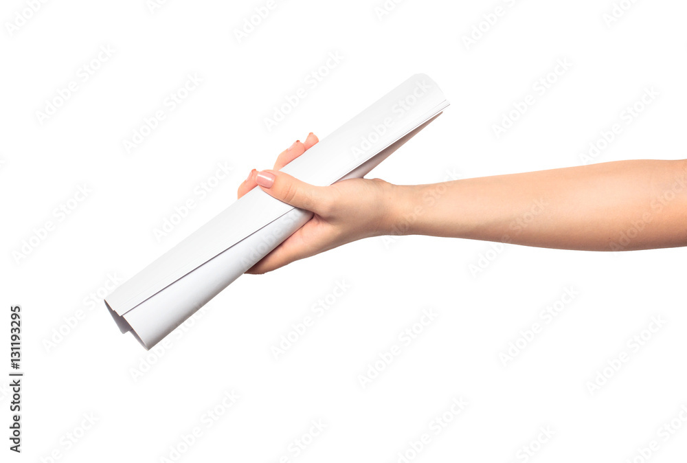 Hand holding paper roll Hand holding paper roll