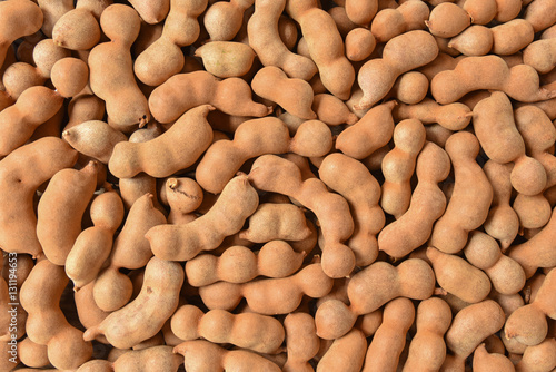 Group of ripe tamarind pods
