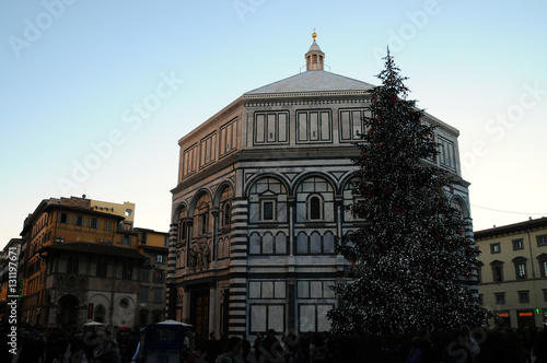 Christmas Tree in Piazzadel Duomo Florence with Baptistery on background. Italy.