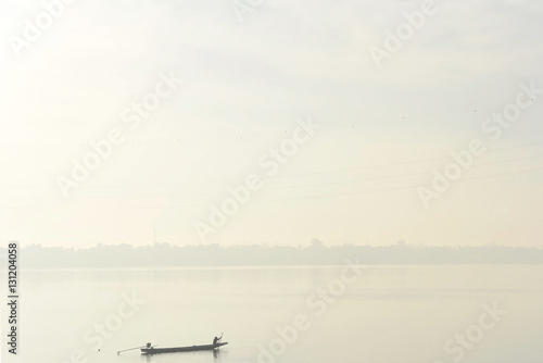 boat in winter season morning at mekong river