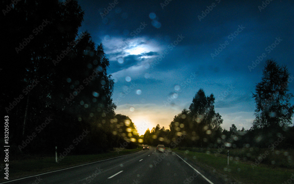 Naklejka premium Sunset through car windscreen